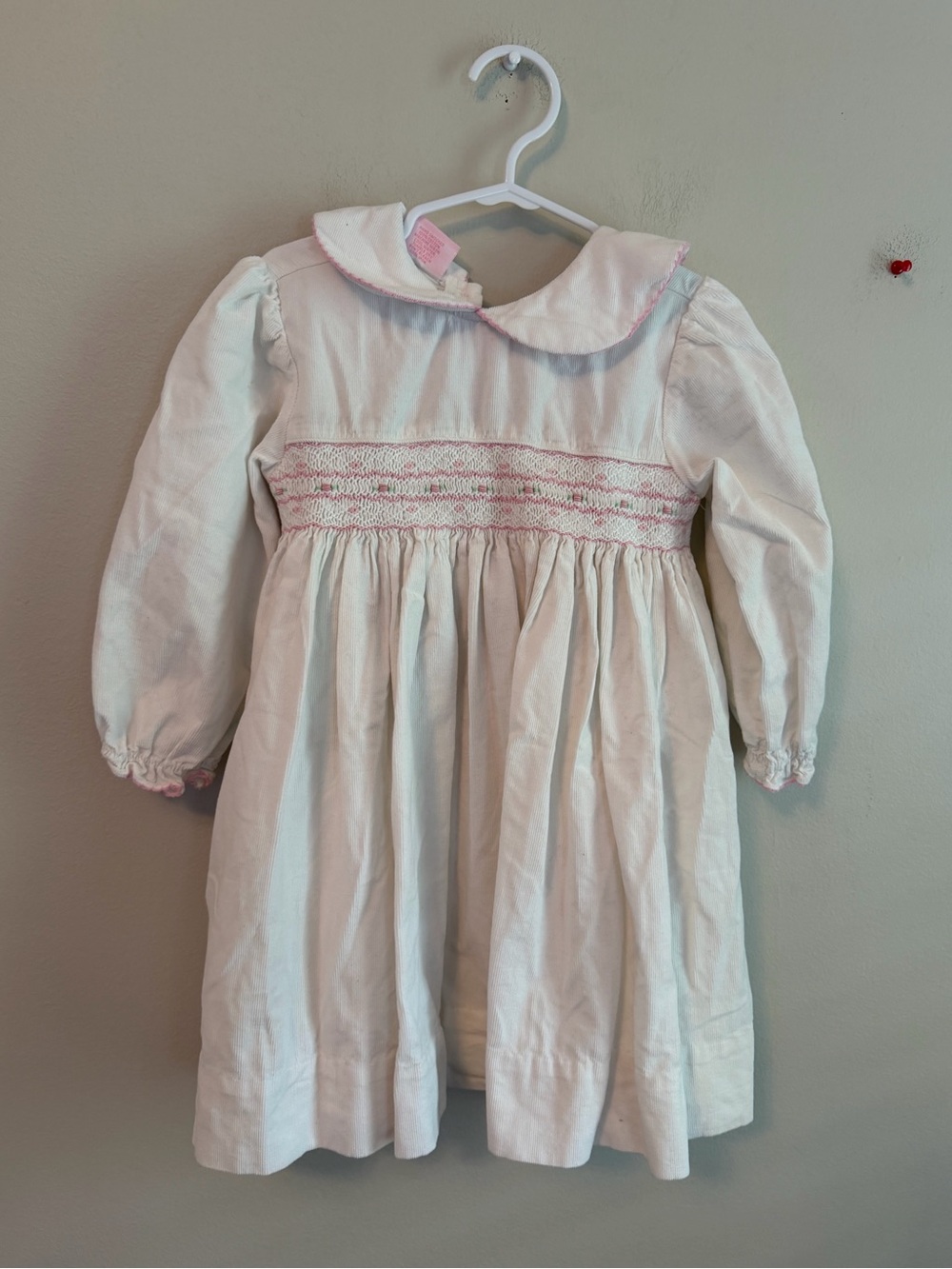 Petit Bebe White Smocked Long Sleeve Dress with Pink Trim